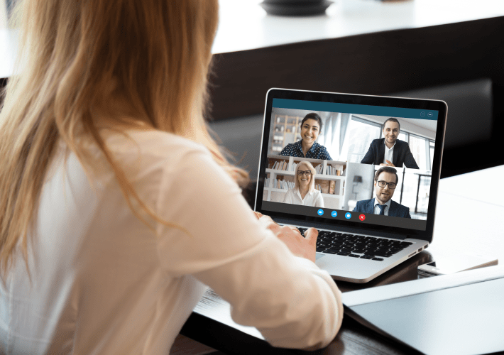 Woman video conferencing with team Woman video conferencing with team