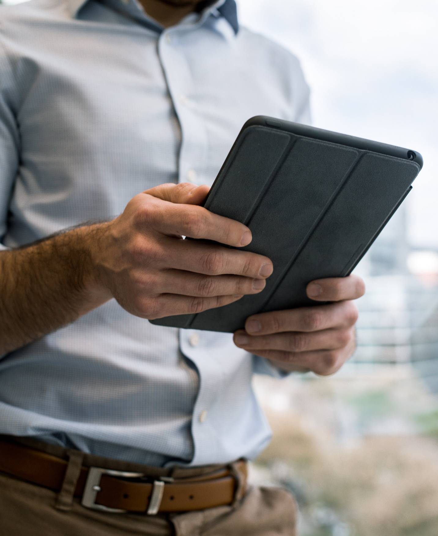 Investor holding iPad