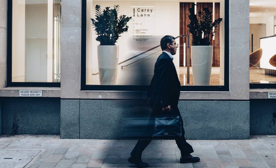 Photo of person walking on street