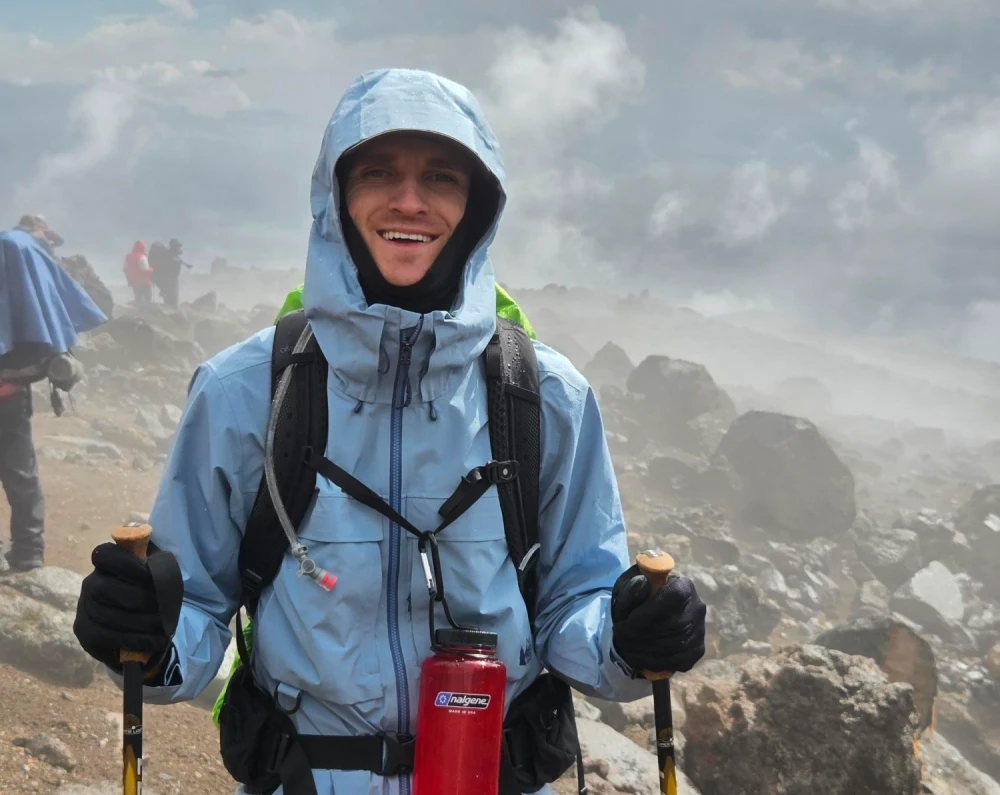 Tyler Hinytzke climbing moountain